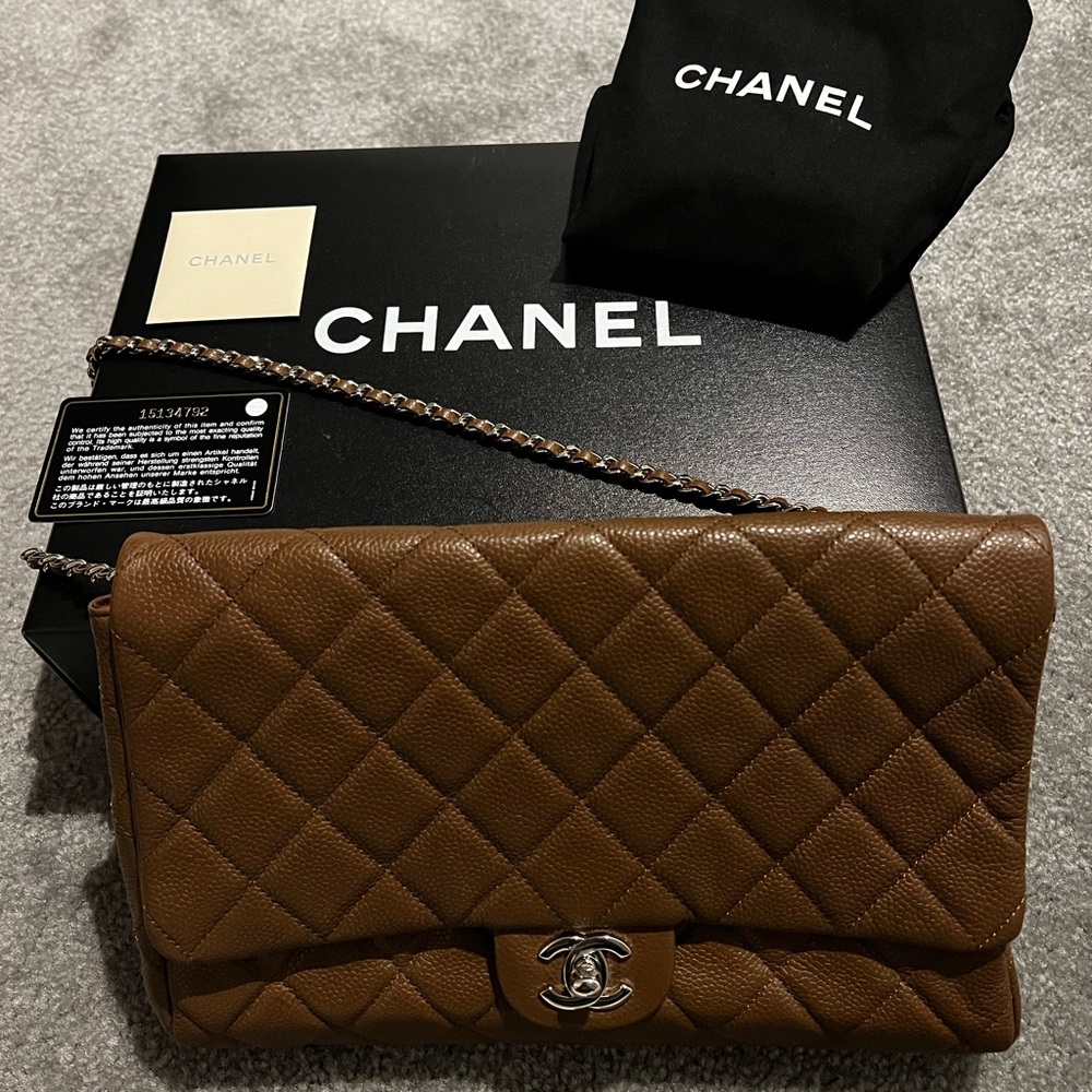 Chanel Caviar Leather Chain Clutch Flap Bag with chain-link shoulder strap